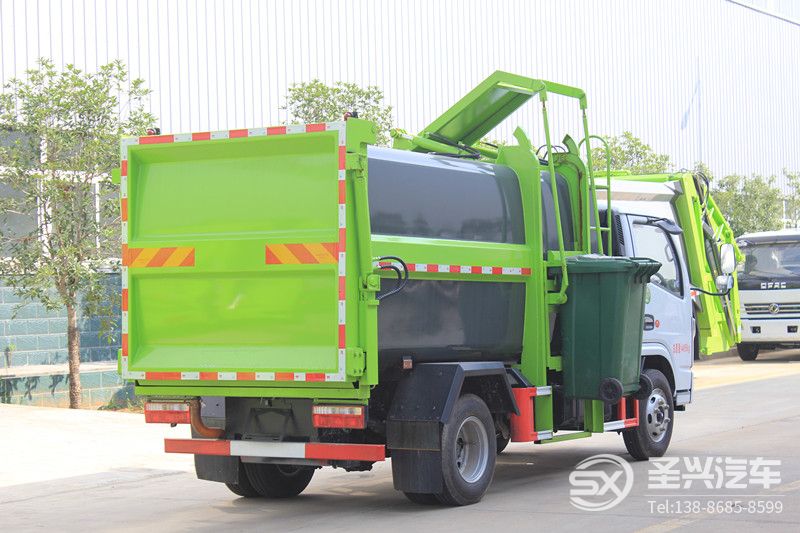 國六-東風多利卡側裝壓縮式垃圾轉運車