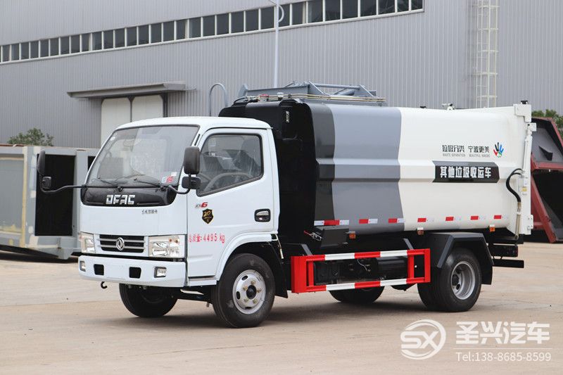 全新款東風多利卡側裝掛桶壓縮垃圾車